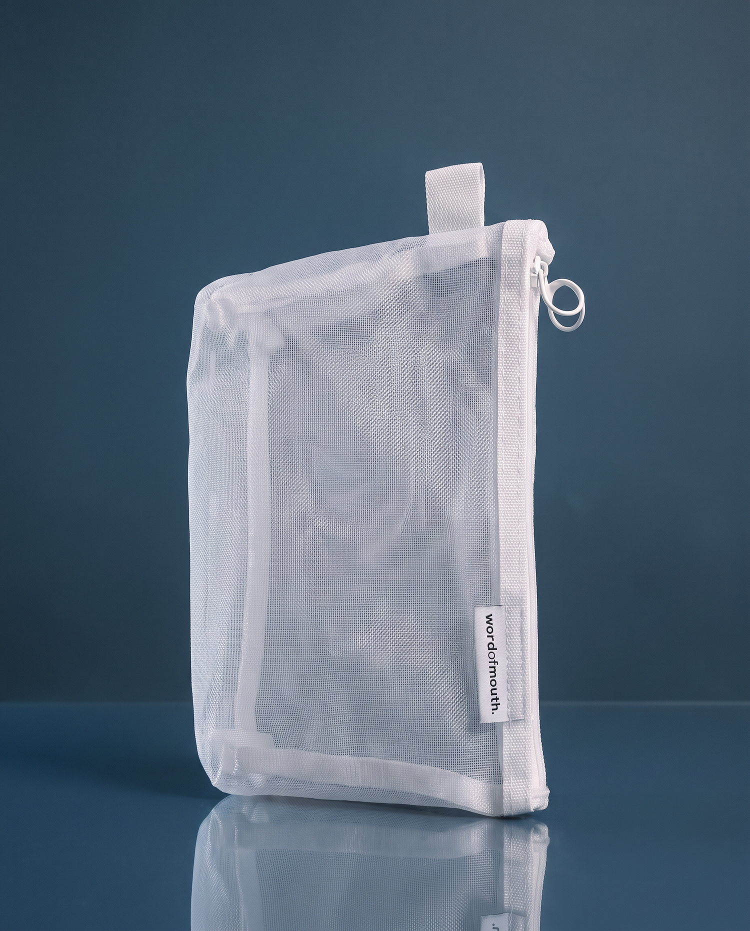 Word of Mouth Essentials Case packed with a toothpaste tube, ready to travel